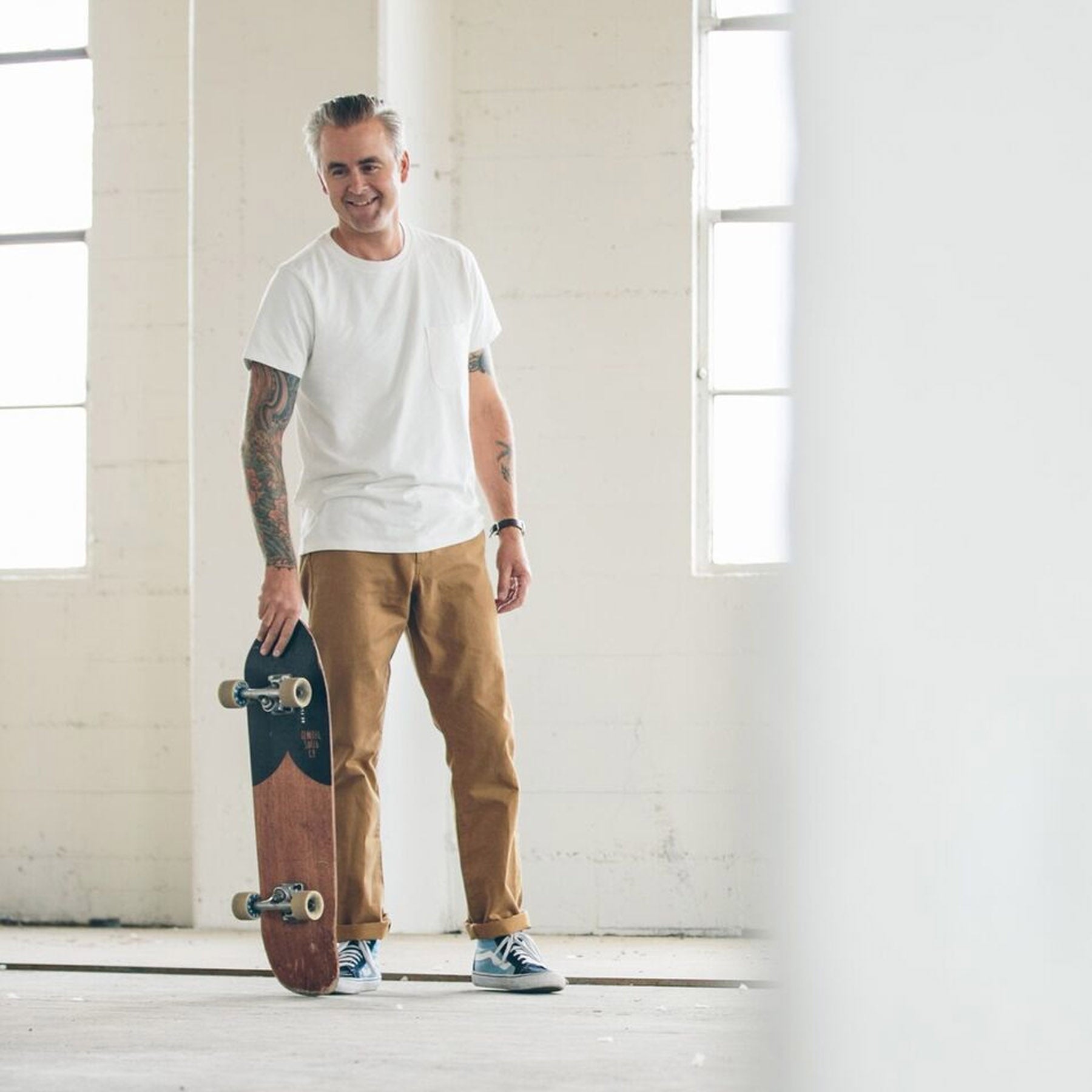 James about to skateboard , Pants by Taylor Stitch
