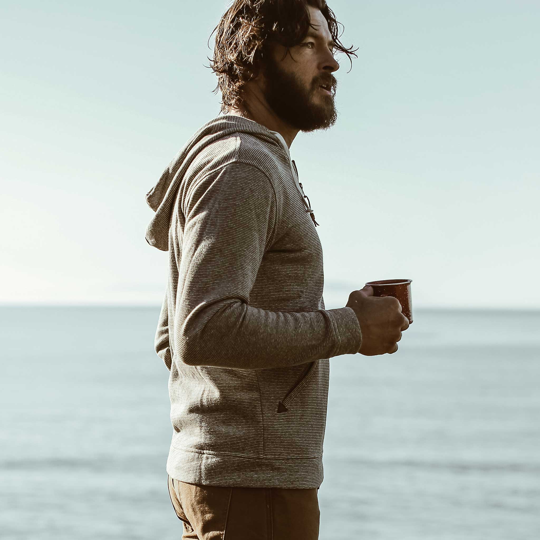 Jonny drinking coffee in the morning., Knits by Taylor Stitch