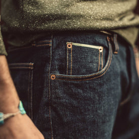 Material shot.Our fit model wearing The Democratic Jean in Organic Stretch Selvage.