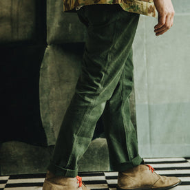 Our fit model wearing The Camp Pant in Dark Olive Tuff Duck from Taylor Stitch.