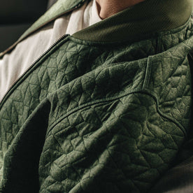 Our fit model wearing The Inverness Bomber in Olive Knit Quilt.