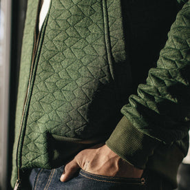 Our fit model wearing The Inverness Bomber in Olive Knit Quilt.