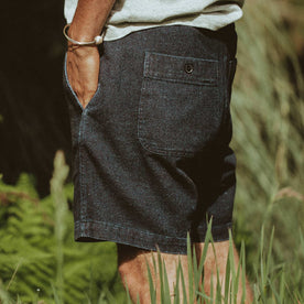 The fit model showing the back pockets in his shorts