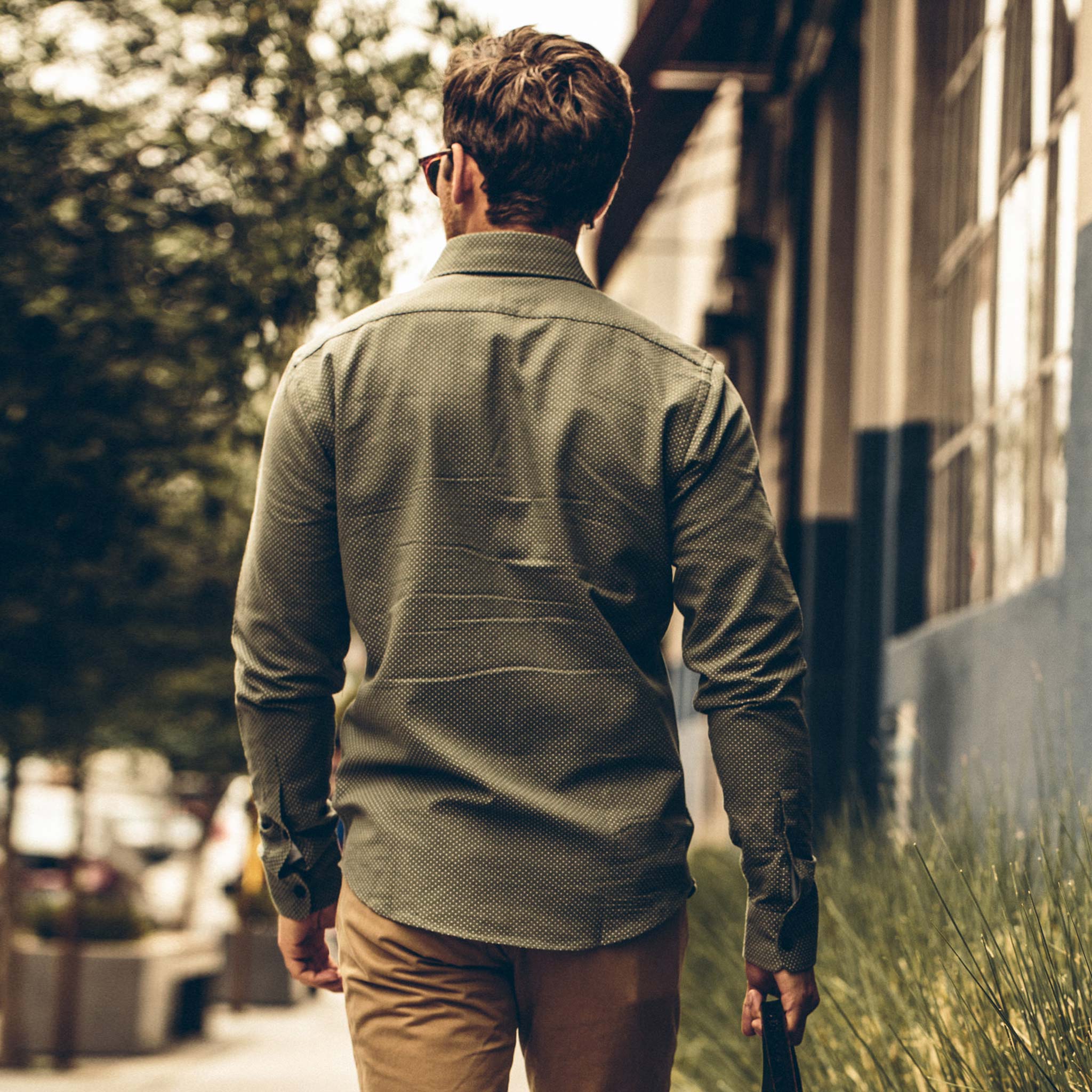 Our for model outside of the magazine shop, Wovens by Taylor Stitch