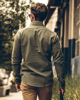 Our for model outside of the magazine shop, Wovens by Taylor Stitch