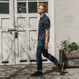 Our fit model wearing the Short Sleeve Hawthorne in Indigo Moon Phase walking in San Francisco.