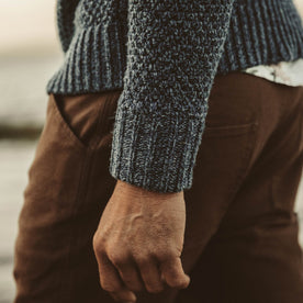 Detail shot of our fit model on the beach in out Fisherman Sweater