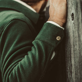 A close up of our fit model wearing the Maritime Shirt Jacket in Olive