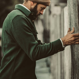 A close up of our fit model wearing the Maritime Shirt Jacket in Olive