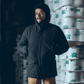 Our fit model wearing the Sierra Parka in an ice cream freezer