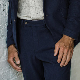 Our fit model wearing The Telegraph Trouser in Navy Boiled Wool by Taylor Stitch.