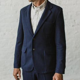 Our fit model wearing The Telegraph Jacket in Navy Boiled Wool by Taylor Stitch.
