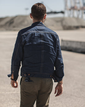 Jackson hanging out in San Francisco showing the back of the jean jacket, Outerwear by Taylor Stitch