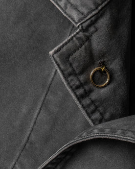 material shot of the interior button on The Ojai Jacket in Washed Charcoal, Outerwear by Taylor Stitch