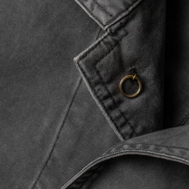 material shot of the interior button on The Ojai Jacket in Washed Charcoal