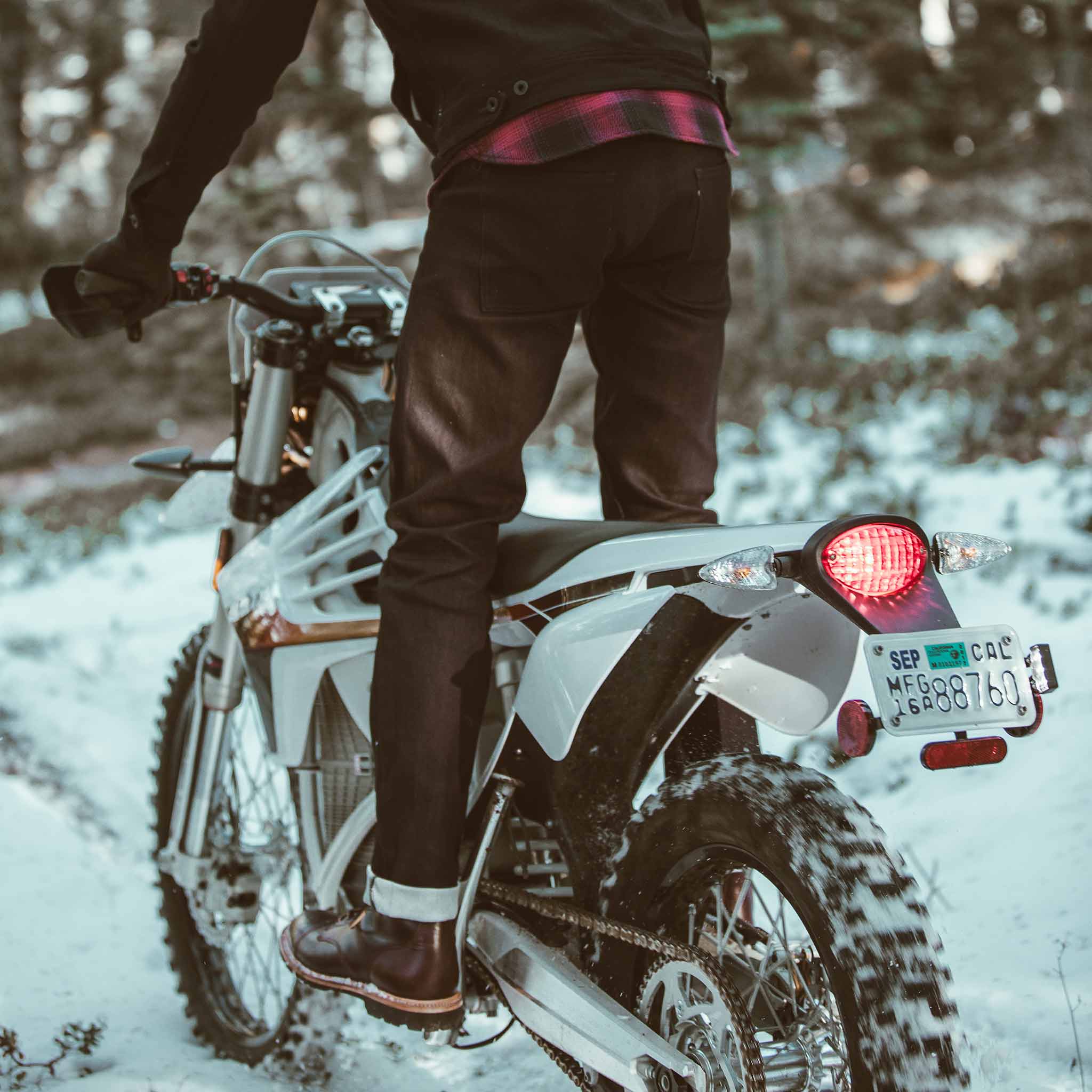 Allen with his motorcycle in the snow, Denim by Taylor Stitch