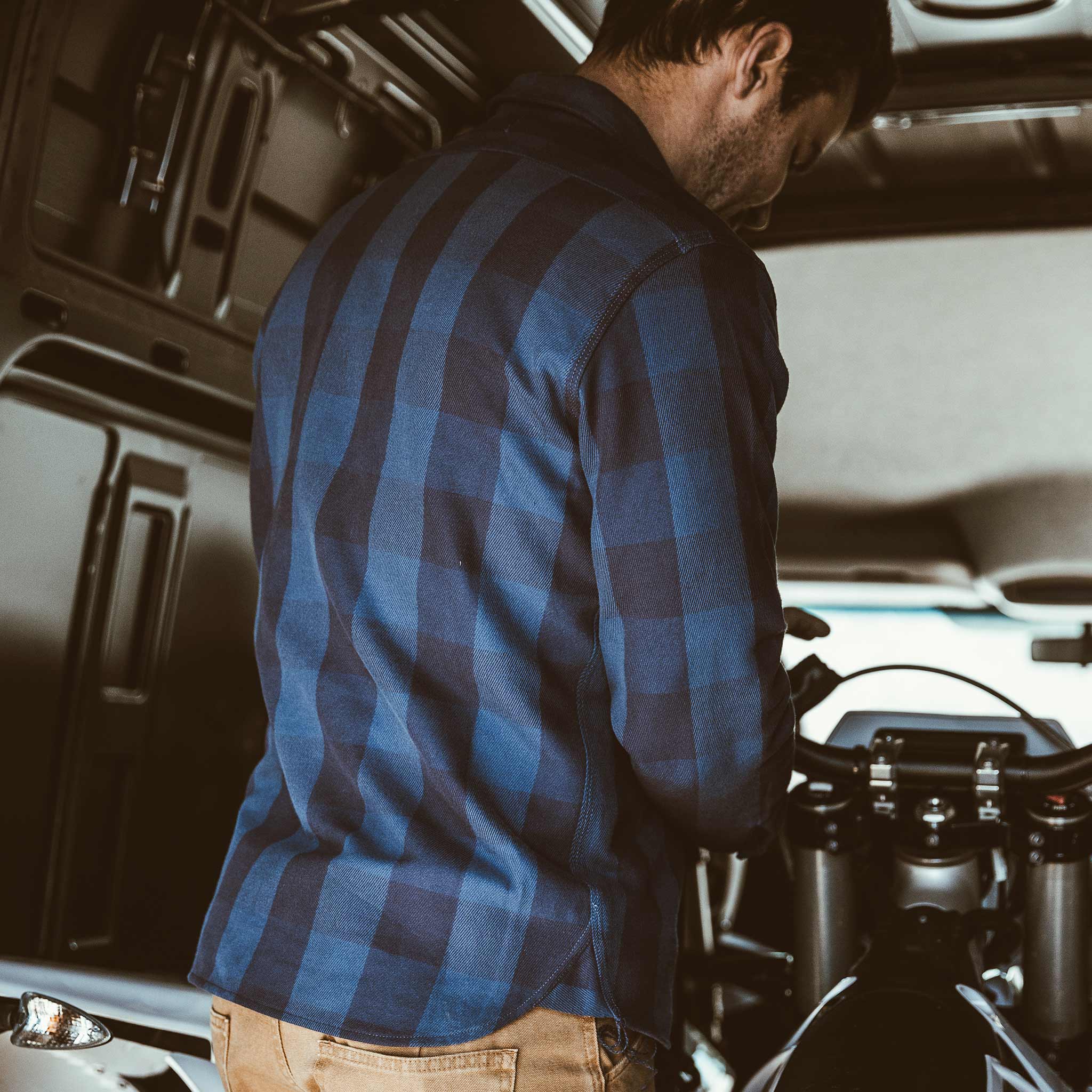 Craig in his van preparing for the ride, Wovens by Taylor Stitch