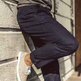 Our fit model wearing The Slim Chino in Organic Navy.