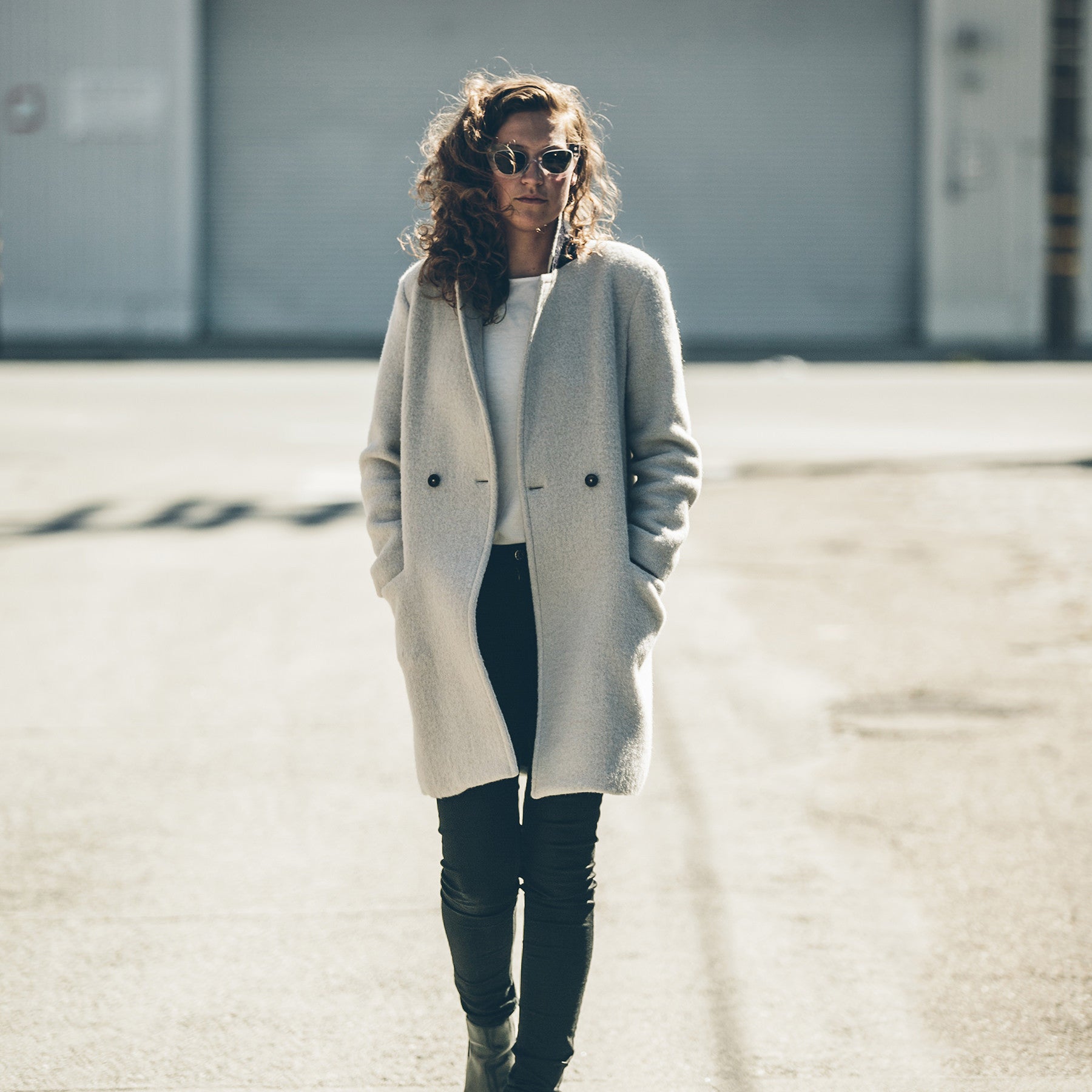 Emily, our photographer, in the Porter Coat, Outerwear by Taylor Stitch
