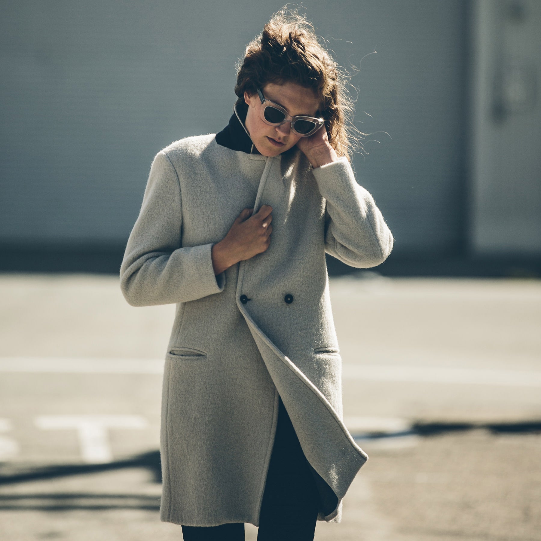 Emily, our photographer, in the Porter Coat, Outerwear by Taylor Stitch