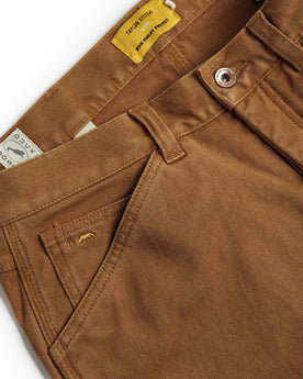 material shot of waistband of The Carpenter Pant in Cedar Boss Duck, Bottoms by Taylor Stitch
