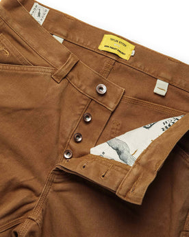 material shot of open zipper fly of The Carpenter Pant in Cedar Boss Duck, Bottoms by Taylor Stitch