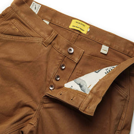 material shot of open zipper fly of The Carpenter Pant in Cedar Boss Duck