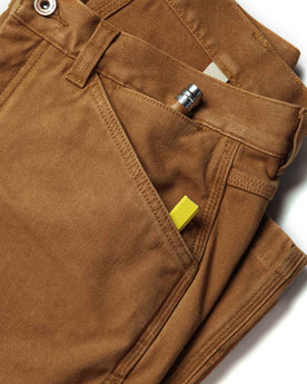 material shot of front pocket of The Carpenter Pant in Cedar Boss Duck, Bottoms by Taylor Stitch