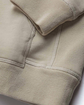 material shot of sleeve hem of The Fillmore Hoodie in Sunflower Embroidery, Knits by Taylor Stitch