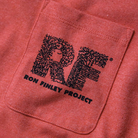 material shot of printed chest pocket of The Heavy Bag Tee in Hibiscus