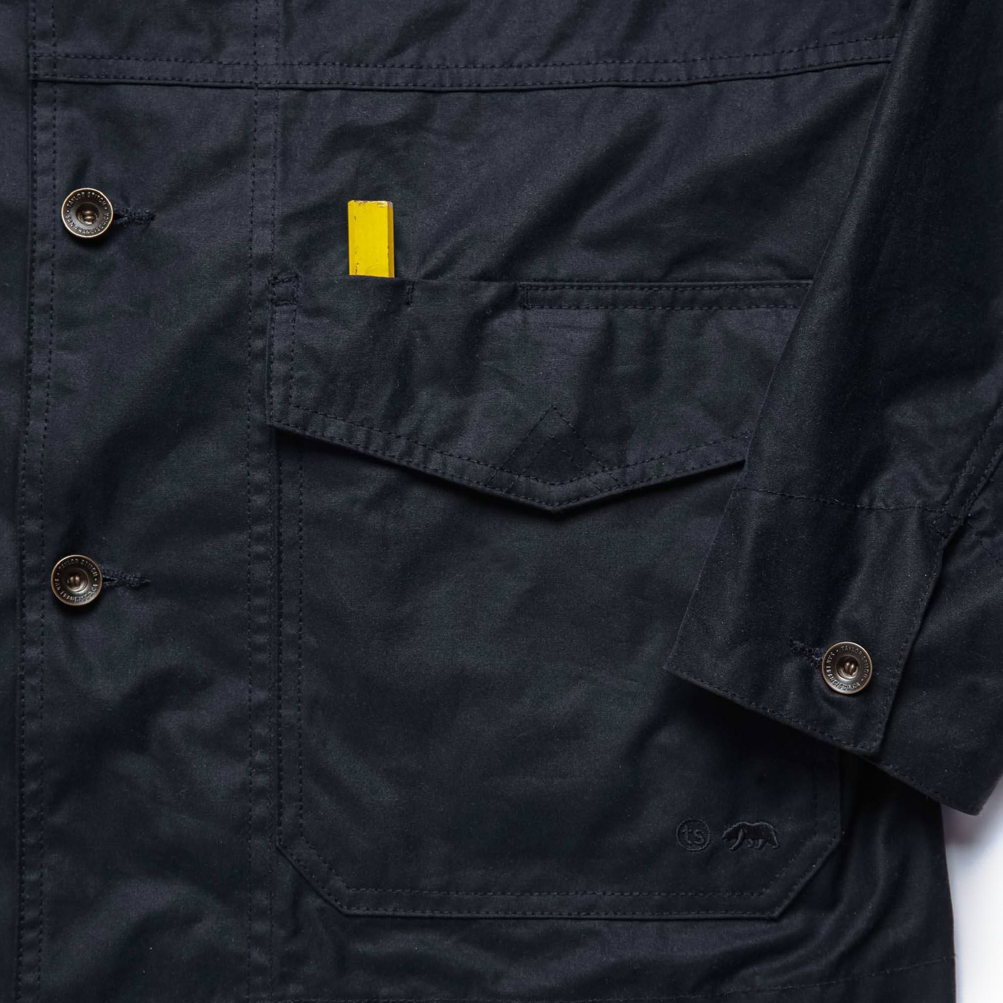 material shot of front pocket of The Task Jacket in Waxed Navy, Outerwear by Taylor Stitch