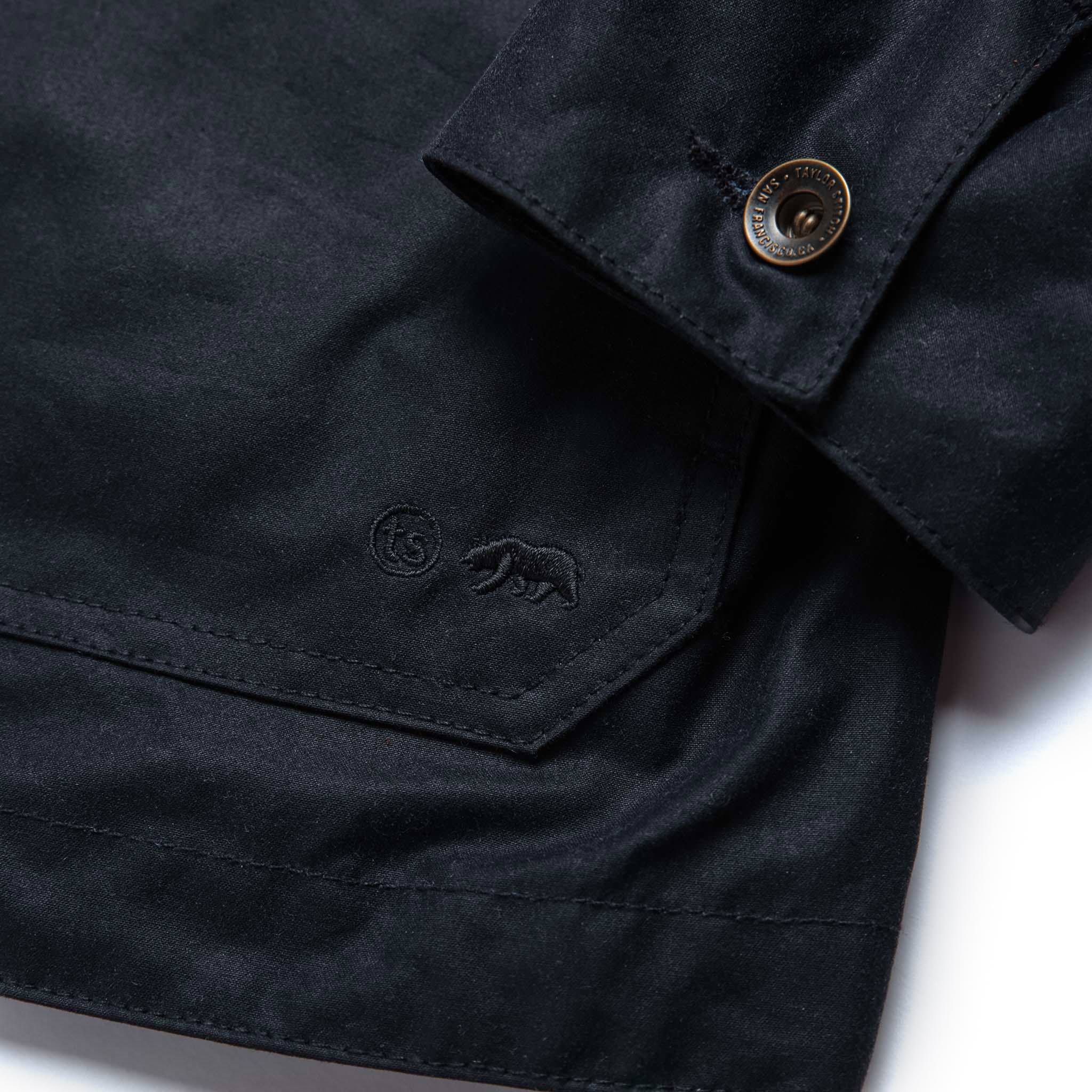 material shot of sleeve cuff of The Task Jacket in Waxed Navy, Outerwear by Taylor Stitch
