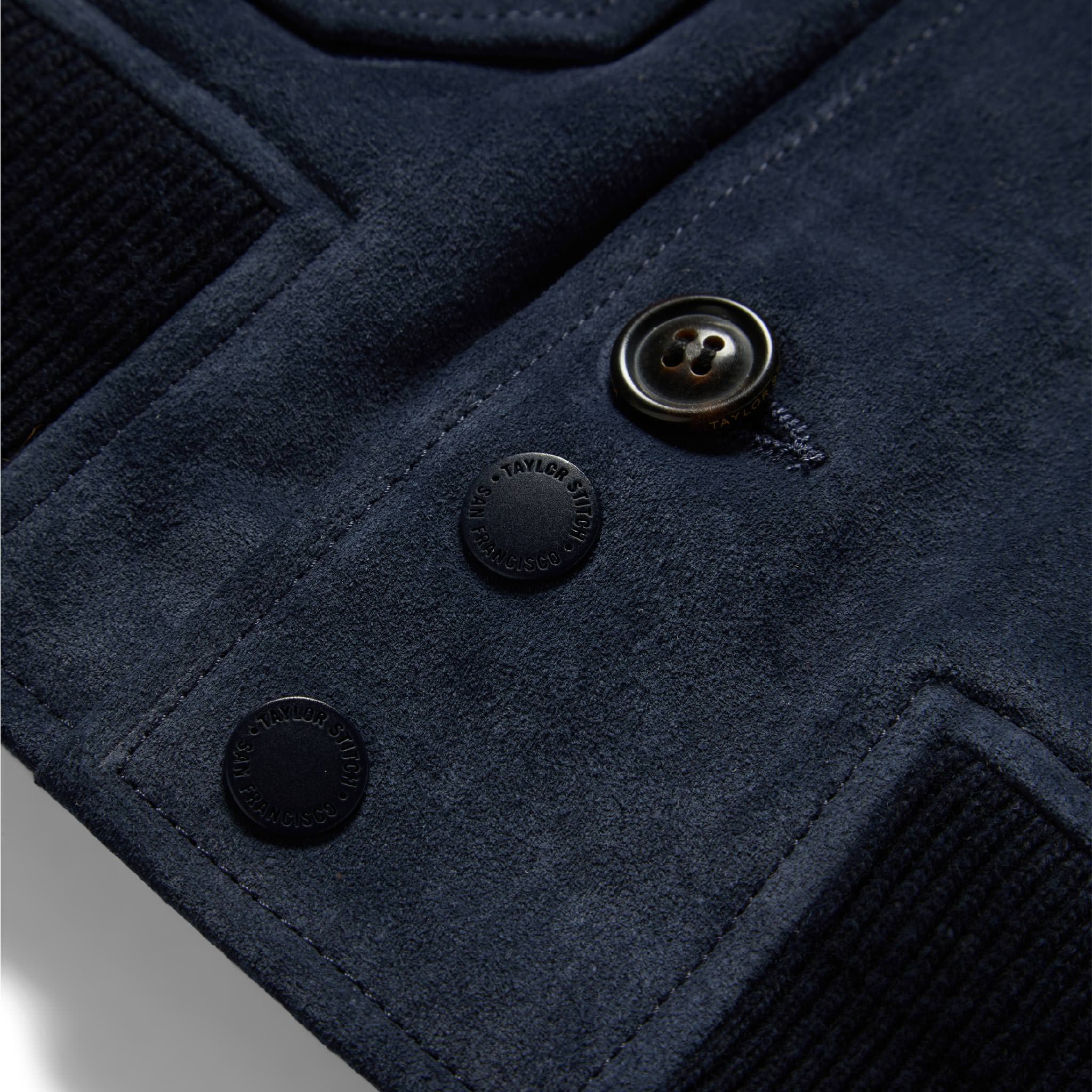 material shot of the front placket buttons of The Aviator Jacket in Midnight Suede, Outerwear by Taylor Stitch