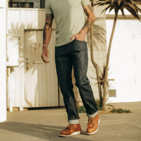 fit model walking down the street in The Democratic Jean in Natural Indigo Selvage