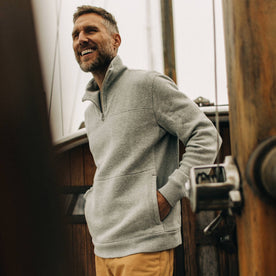 fit model with hands in pocket of The Horizon Pullover in Ash Double Knit