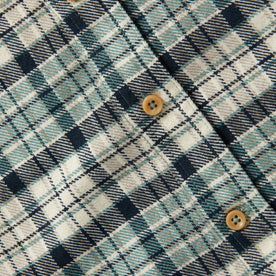 material shot of The Ledge Shirt in Blue Plaid's placket and buttons