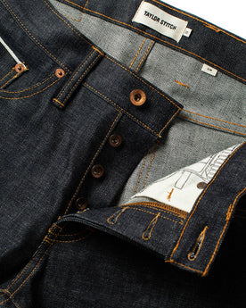 material shot of the waist on The Slim Jean in Natural Indigo Selvage, Bottoms by Taylor Stitch