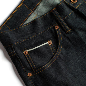 material shot of the pockets and hardware on The Slim Jean in Natural Indigo Selvage