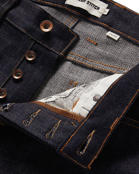 material shot of the button fly on The Democratic Jean in Kuroki Welterweight Slub, Bottoms by Taylor Stitch