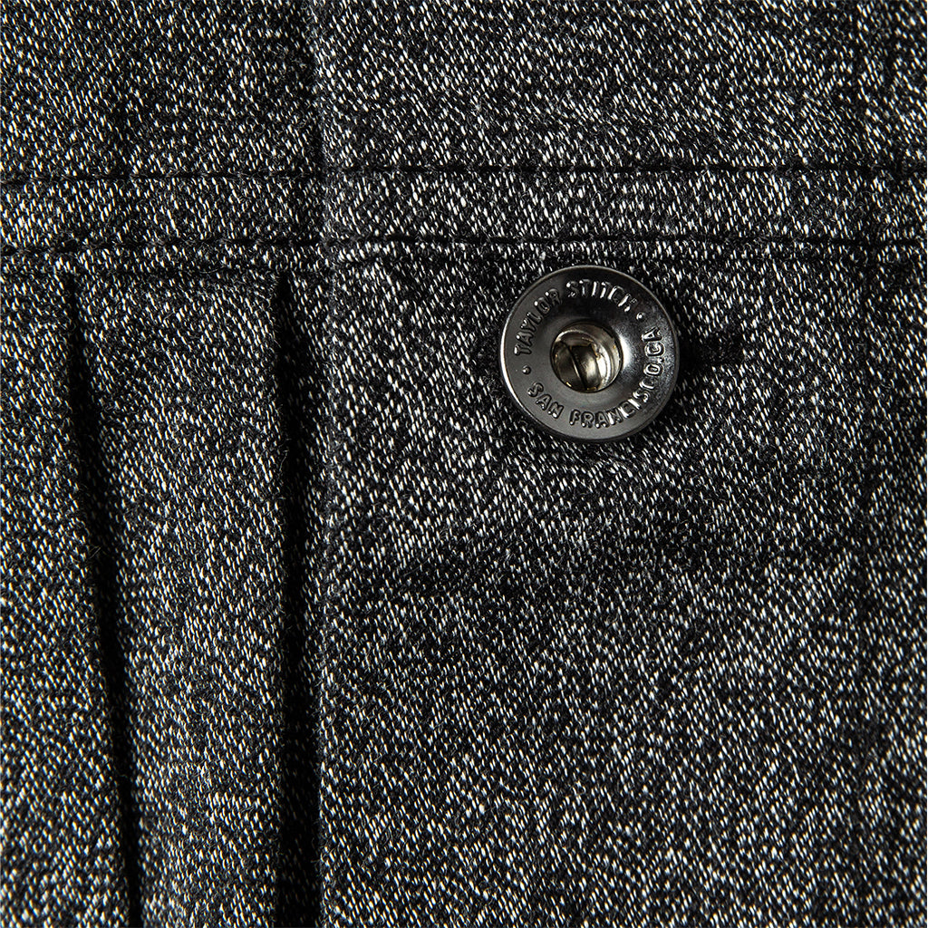 material shot of button and pleat, Outerwear by Taylor Stitch