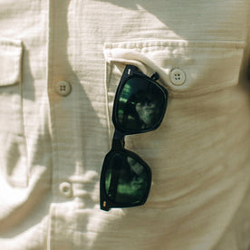 fit model wearing The Point Shirt in Natural Reverse Sateen, sunglasses tucked in front pocket