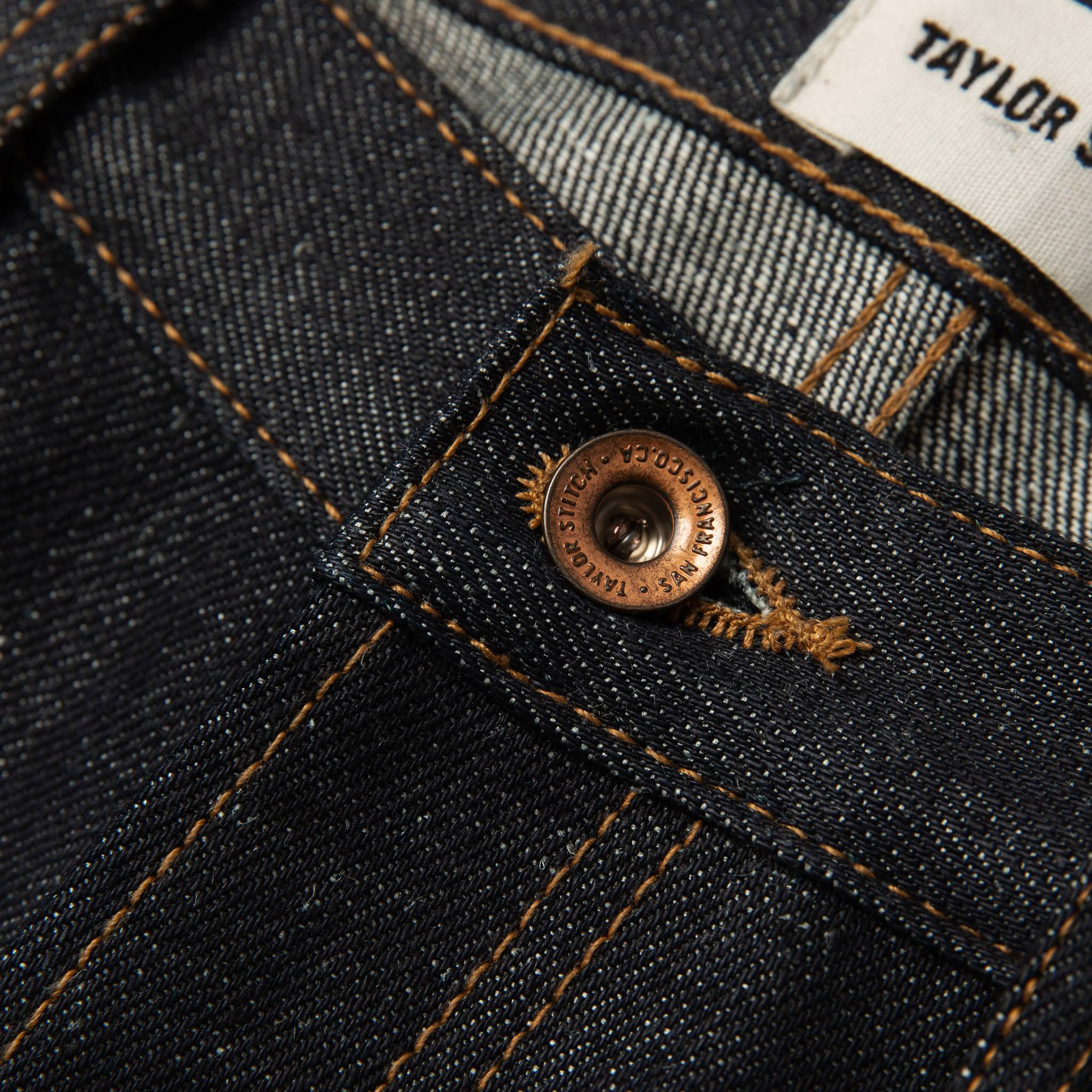 material shot of button, Bottoms by Taylor Stitch