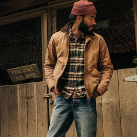 fit model wearing The Workhorse Jacket in Tobacco Boss Duck, looking right