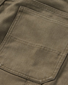 material shot of the rear pocket on The Shaper Short in Stone Boss Duck, Bottoms by Taylor Stitch