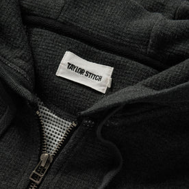 material shot of the zipper on The Weekend Hoodie in Coal Double Knit