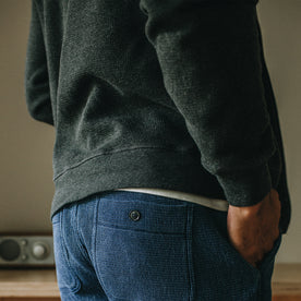 fit model showing the back of The Weekend Hoodie in Coal Double Knit