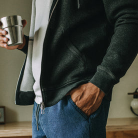 fit model showing the side of The Weekend Hoodie in Coal Double Knit