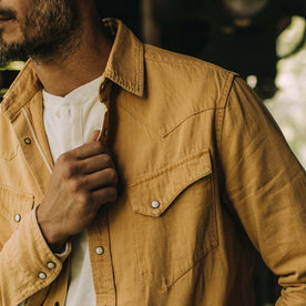 fit model showing poscket details on The Western Shirt in Wheat Selvage Denim