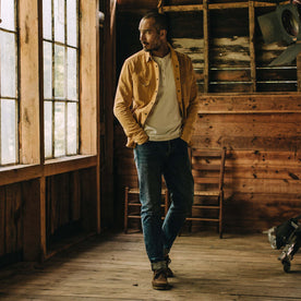 fit model walking in The Western Shirt in Wheat Selvage Denim
