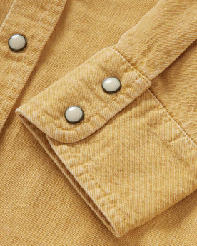 material shot of the cuff of The Western Shirt in Wheat Selvage Denim, Wovens by Taylor Stitch
